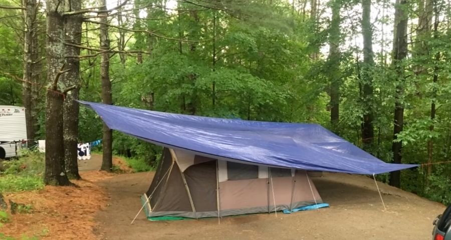 Waterproofing tent with tarp