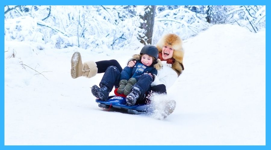 sledding during winter camping