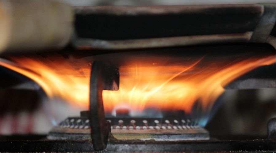 yellow flame on camp stove